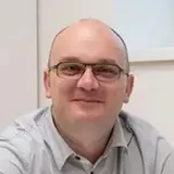 Dr. Adrian Surd