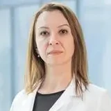 Dr. Monica Lacatus